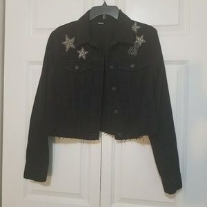 Black denim jacket with stars
